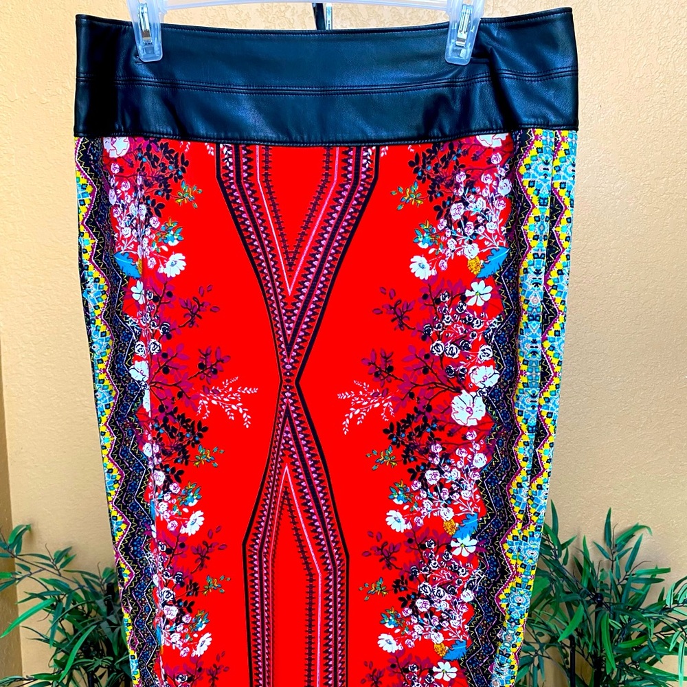 Red skirt w/ flowers, mid knee length